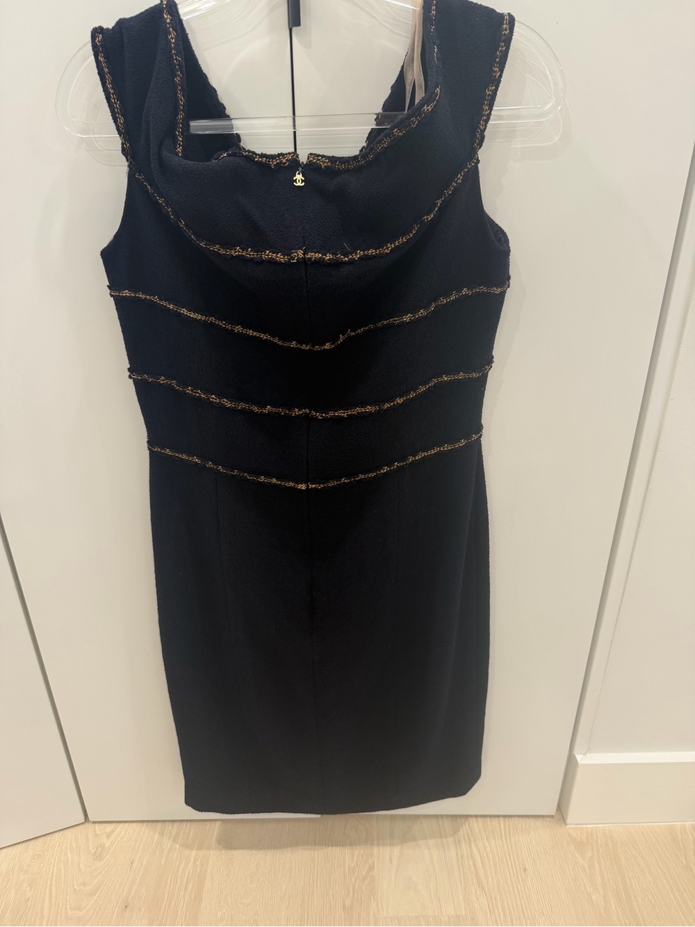 CHANEL Black Midi Dress with Gold Trim and Signature Charm